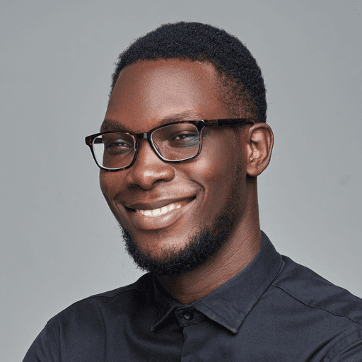 man in black dress shirt wearing black framed eyeglasses
