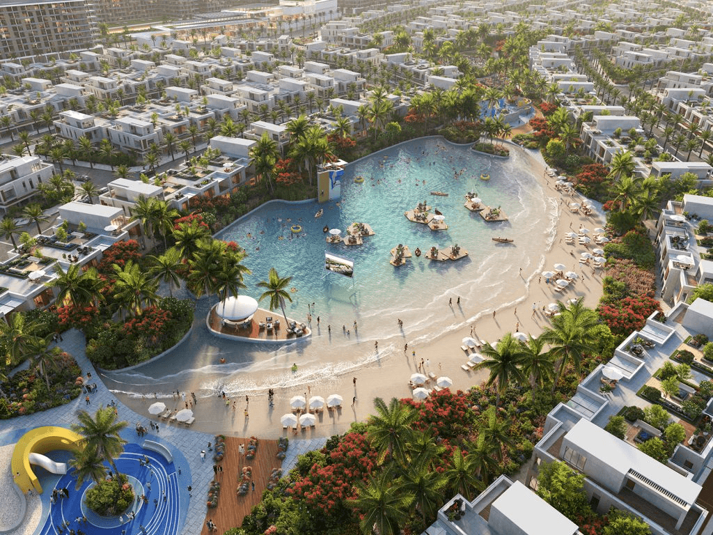 Orange tulips in a vase on a coffee table.