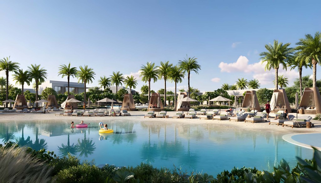 A tranquil swimming pool surrounded by vibrant greenery at Address Villas Tierra.
