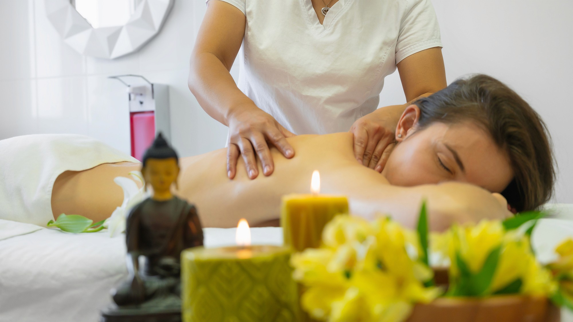 Tropical beach with umbrellas and lounge chairs.