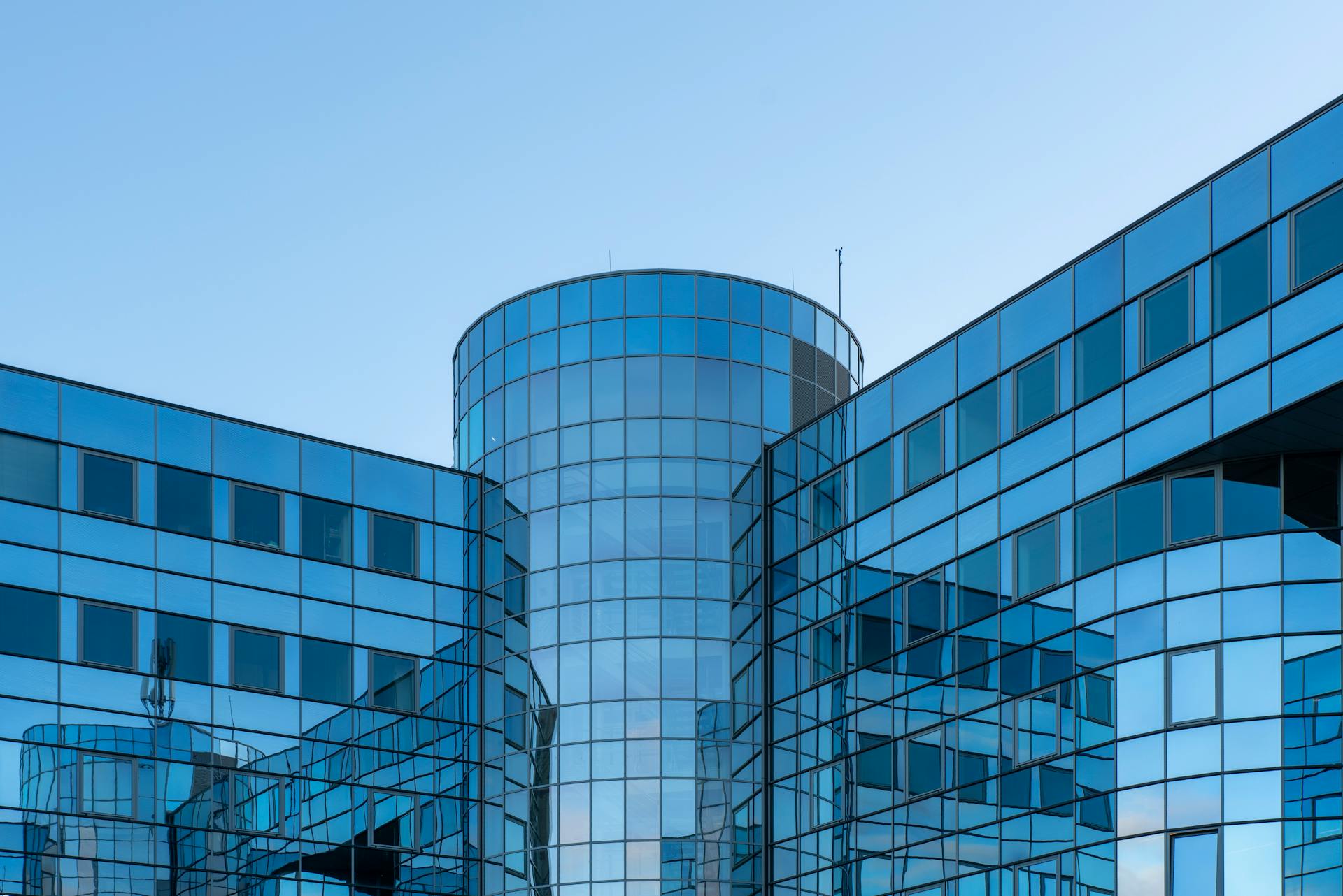 Modern corporate building representing AI-driven analytics, operational strategy, and scalable enterprise transformation.