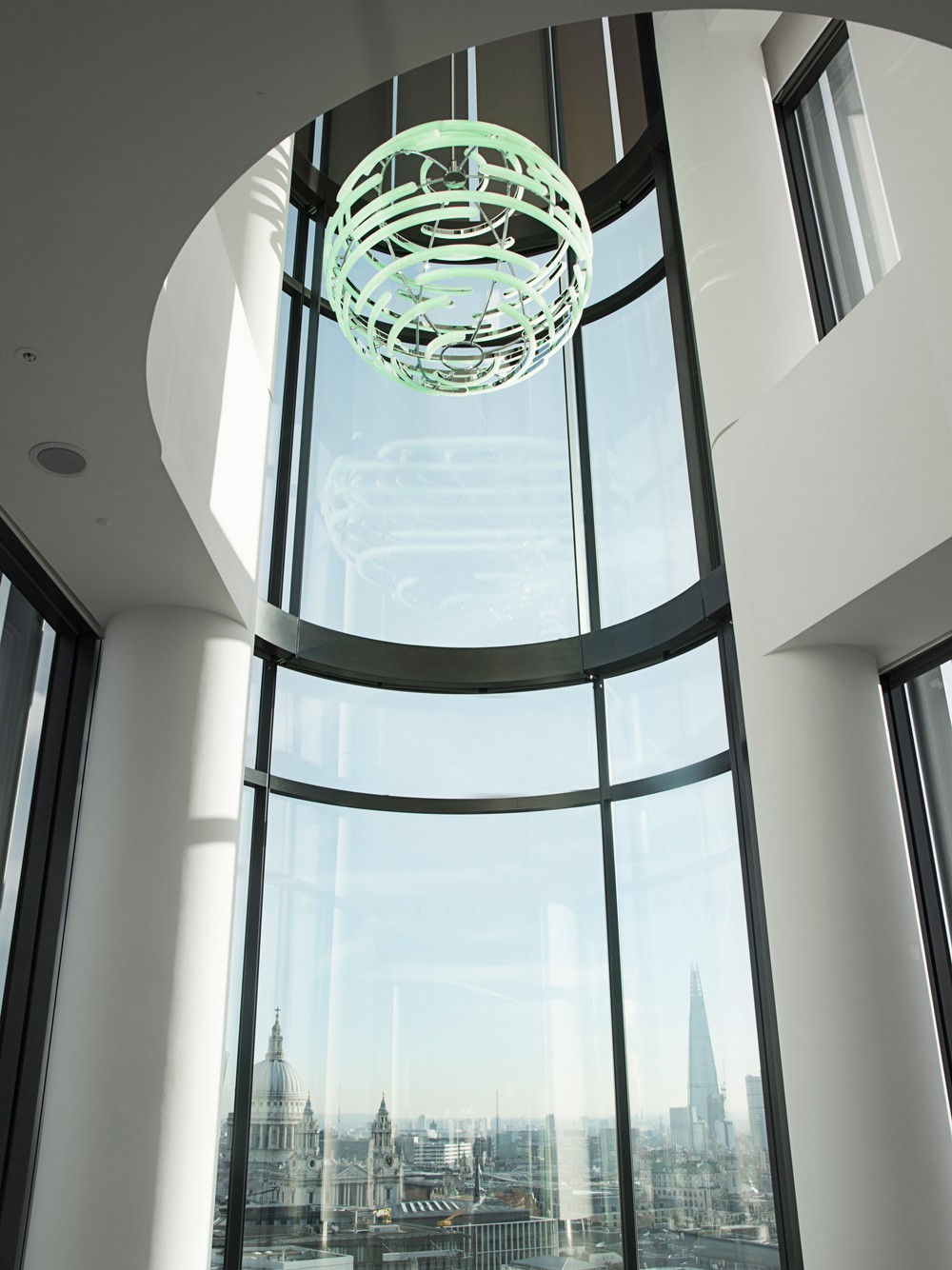 "Side perspective of Deloitte Orb showcasing colour-changing LEDs referencing Deloitte's green dot logo