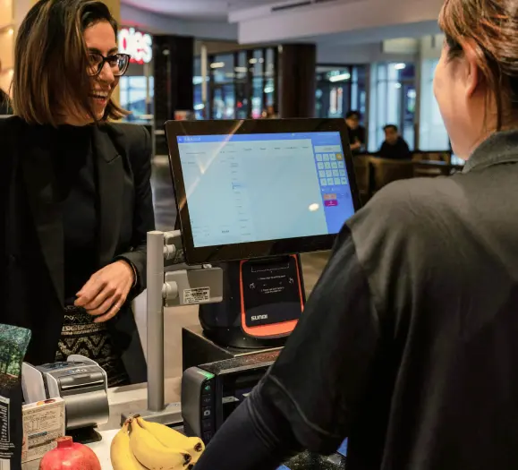 cashier serve customer with abacus point of sale