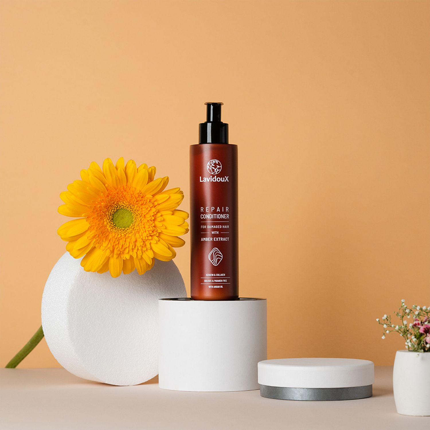 Photo of a shampoo bottle and yellow flower