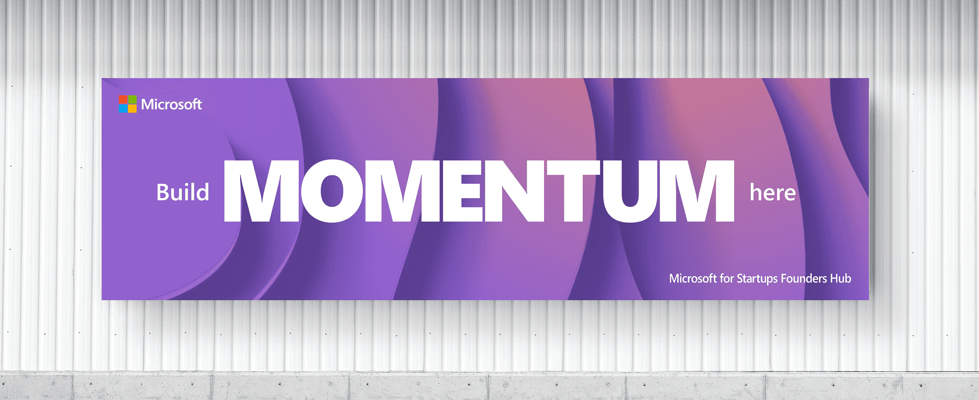 Wide marketing poster for Microsoft for Startups Founders hub, Build momentum here