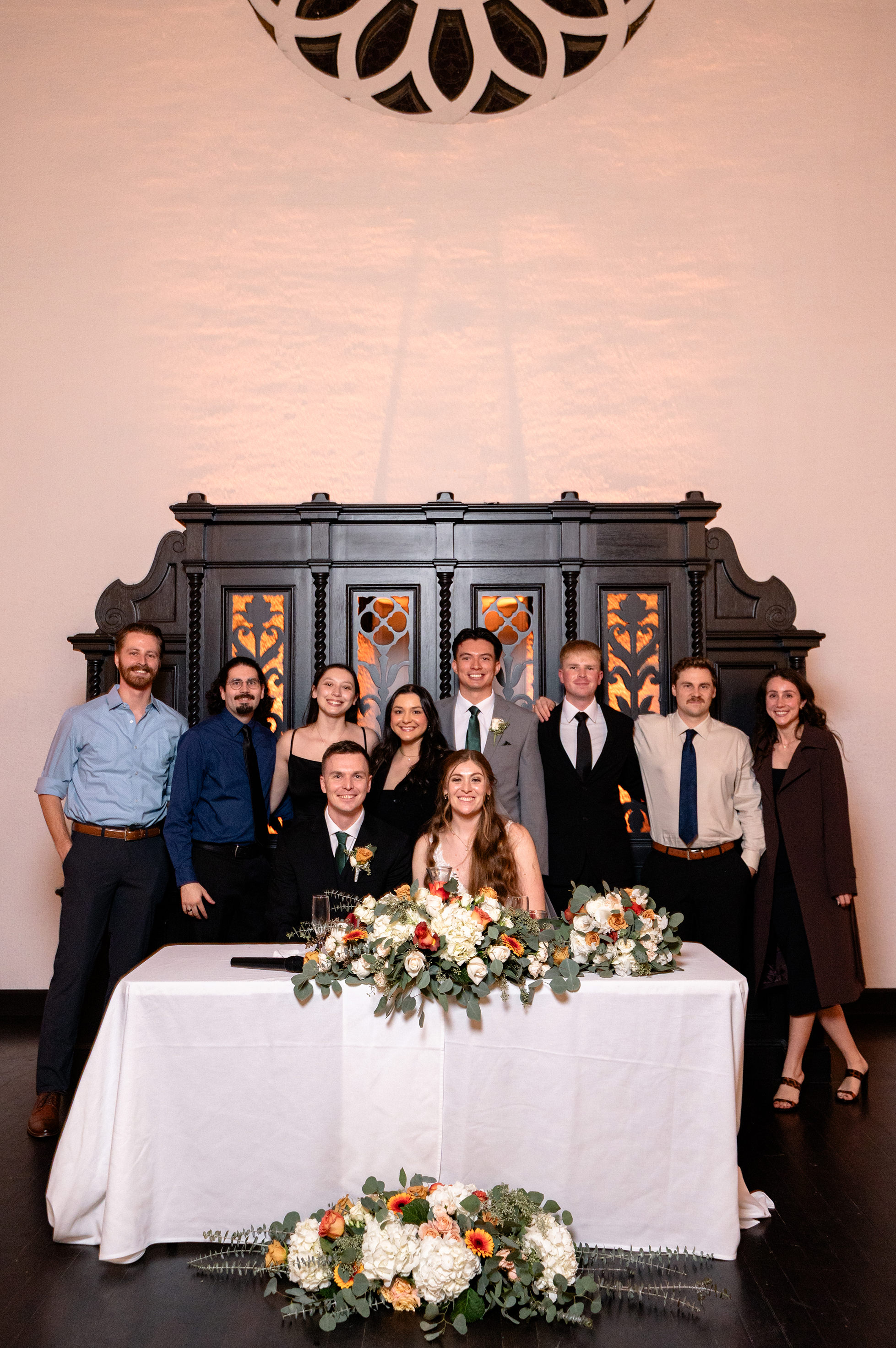 Flat lay wedding details with bouquet, rings, and sparkling bridal heels