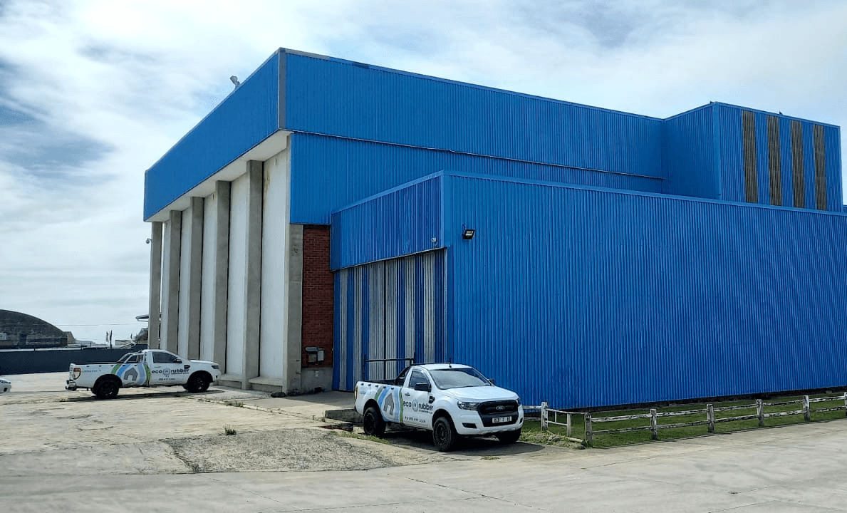 Cars in front of a warehouse that is waterproofed