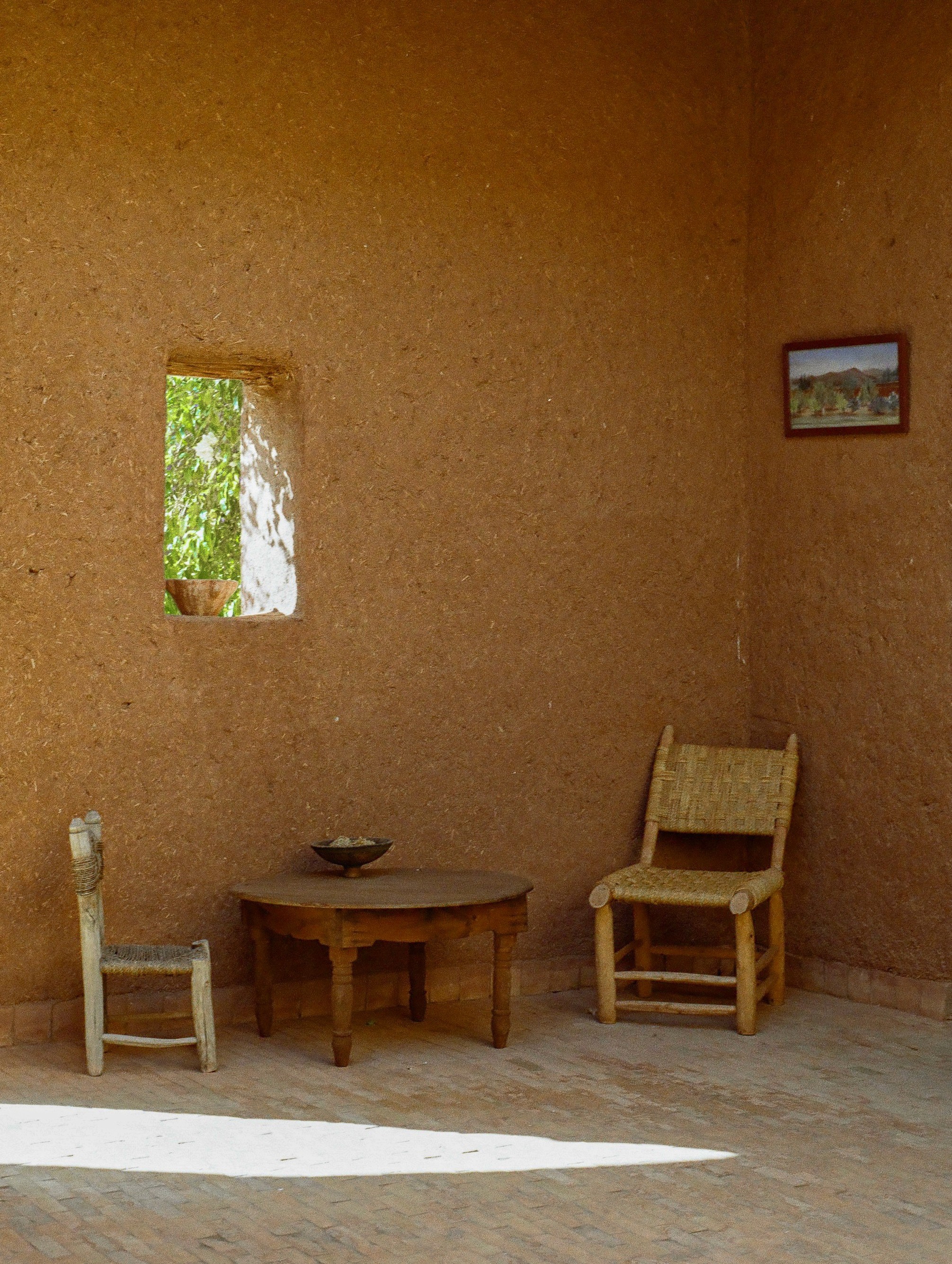 Vertical interior photograph of Dar Tasmayoun guesthouse in Morocco.