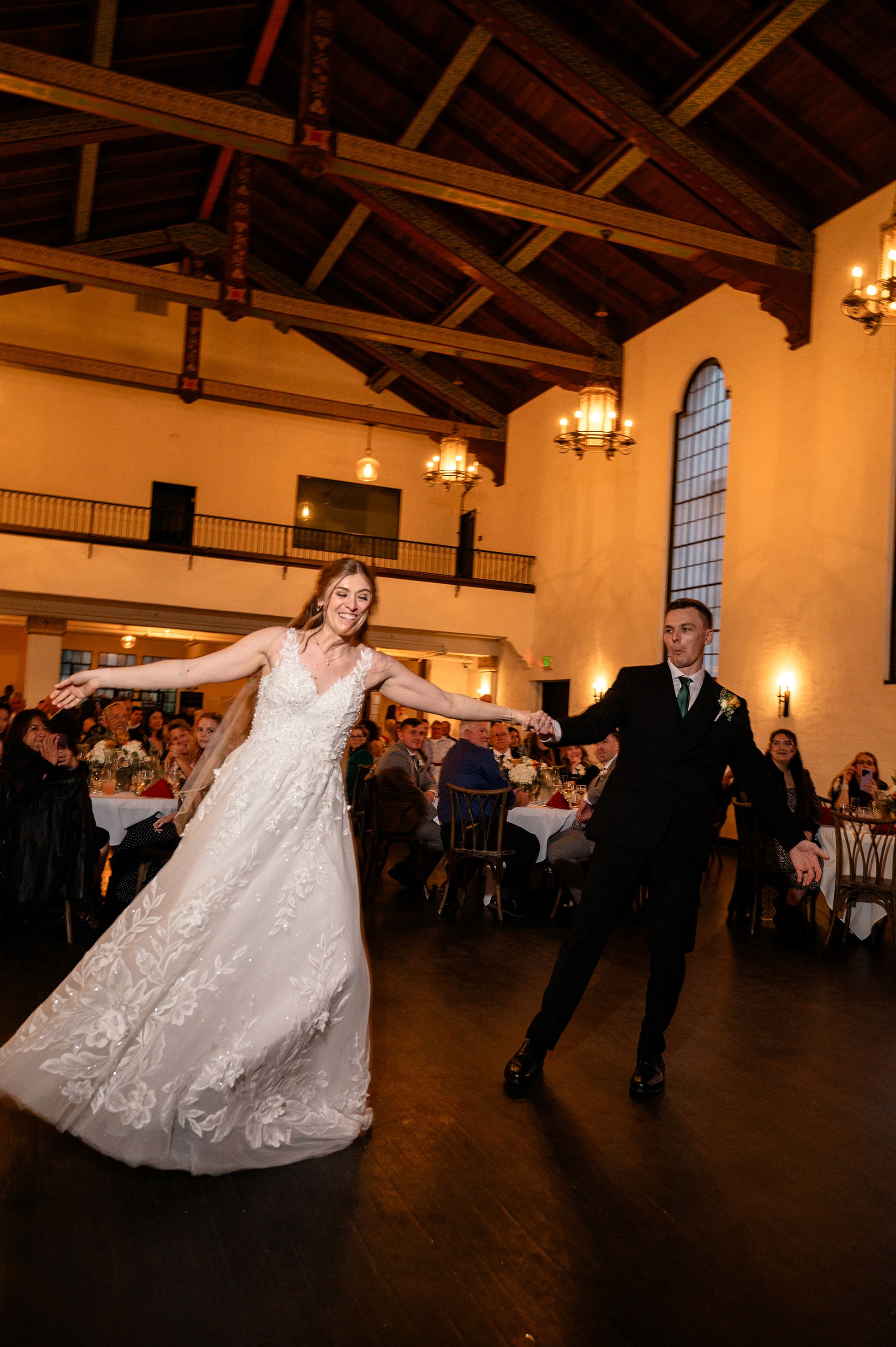 Flat lay wedding details with bouquet, rings, and sparkling bridal heels