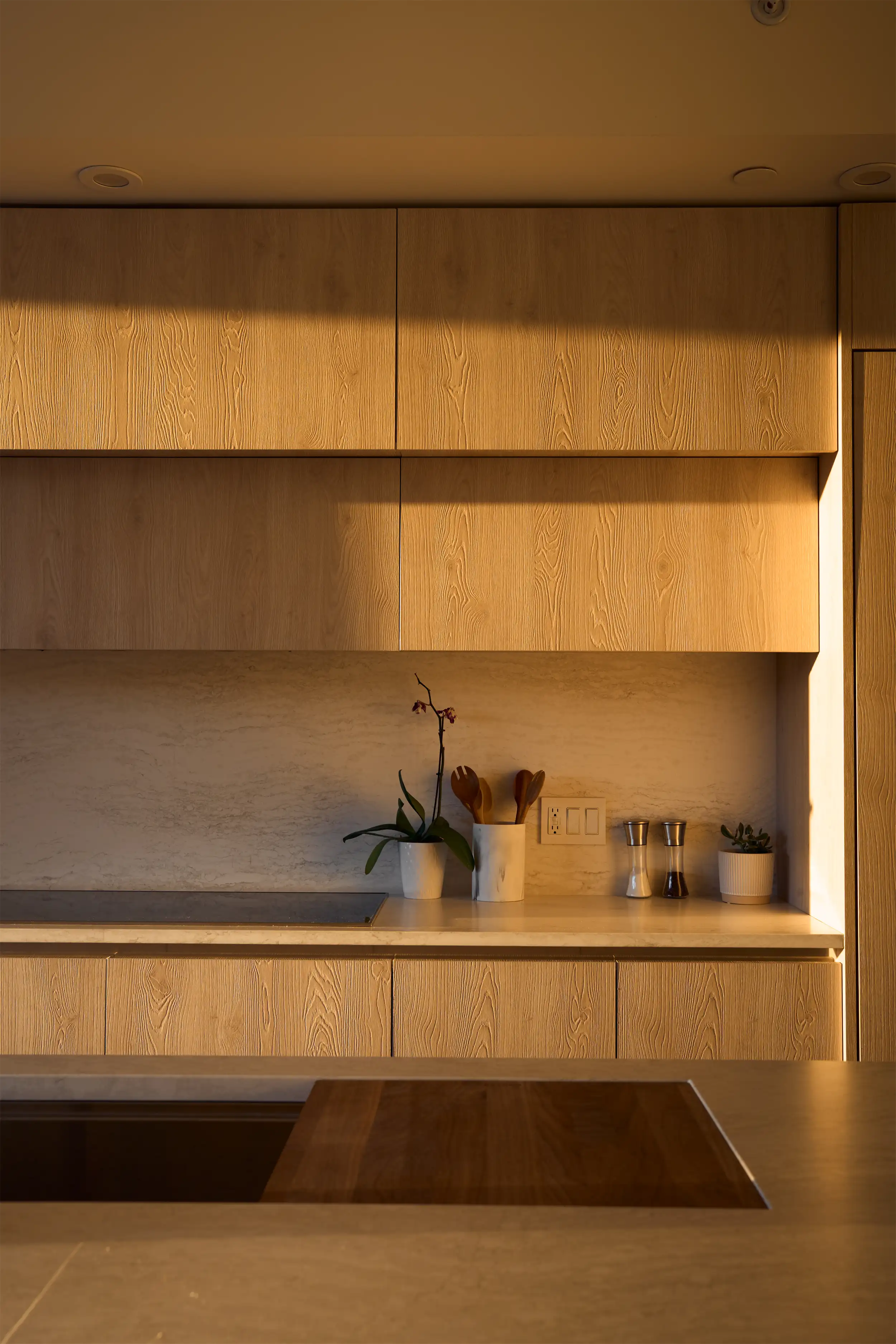 A vintage-style bar with classic wooden furnishings and ambient lighting.