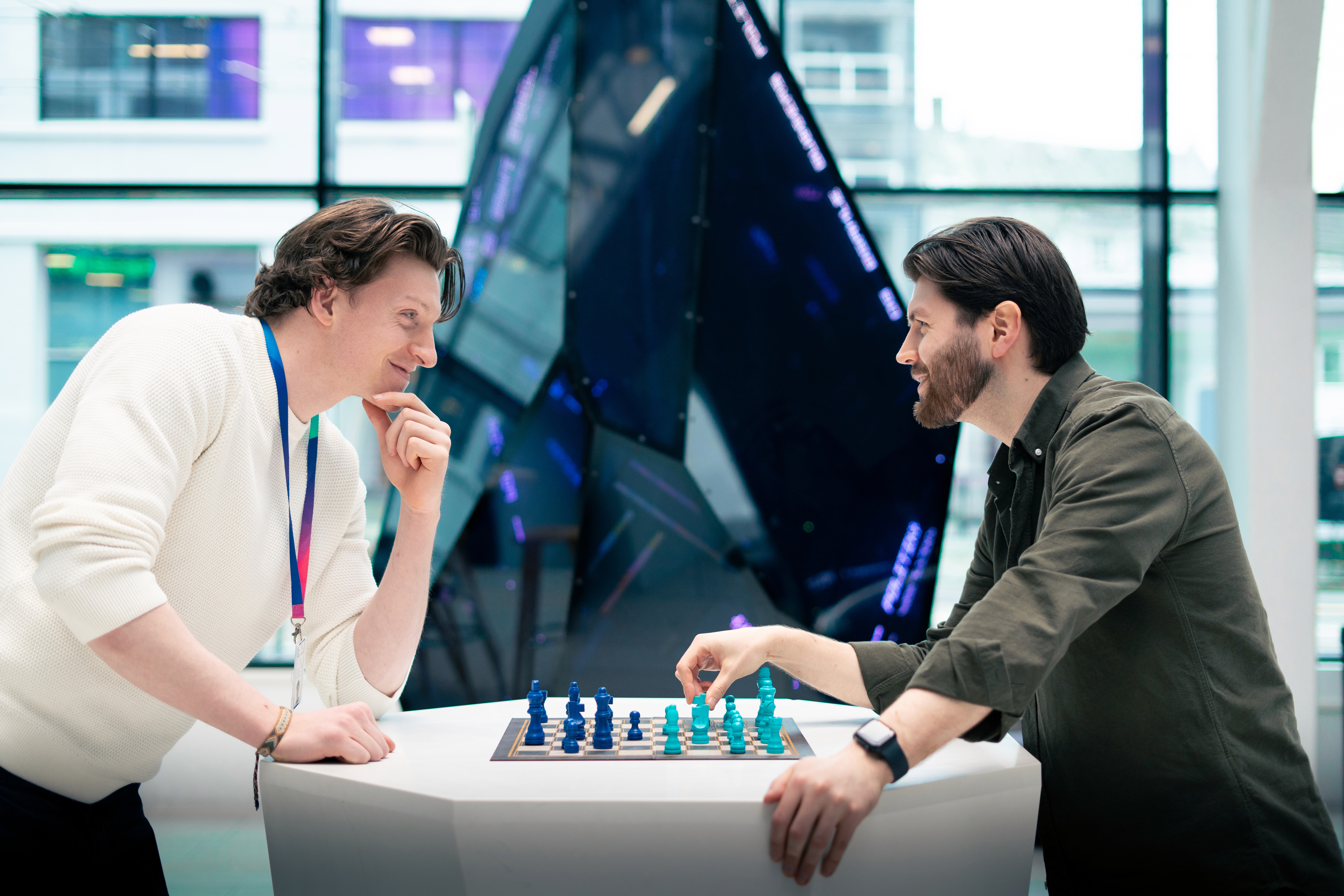 a man holding a cocktail