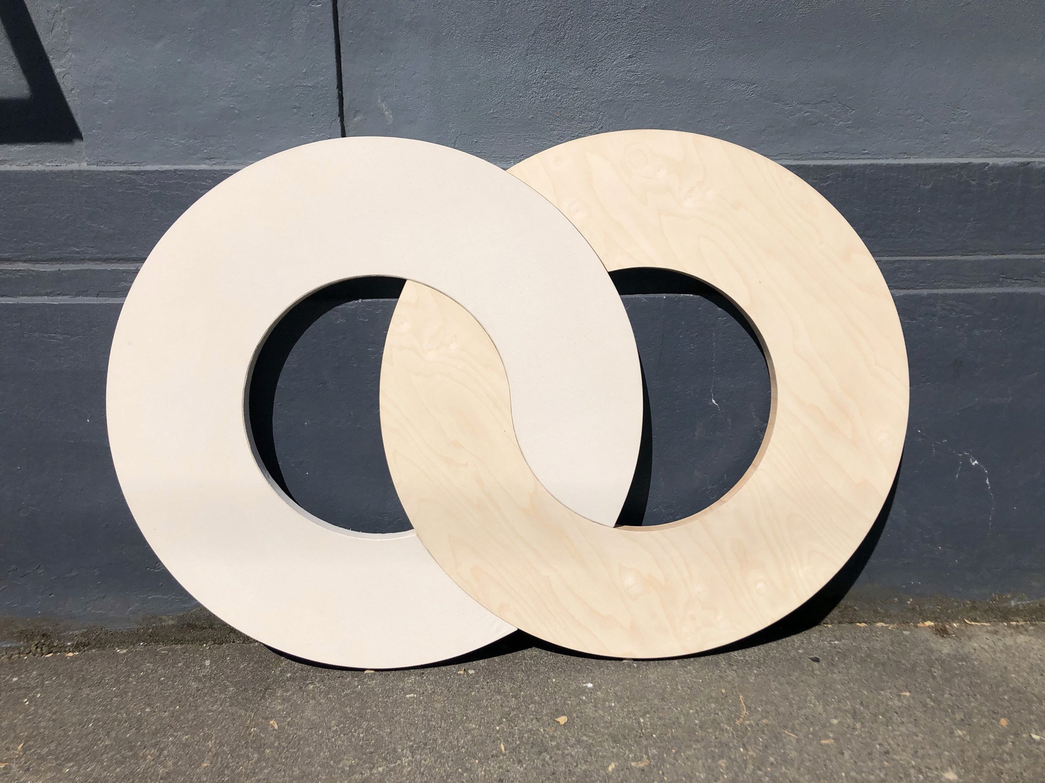 Two interlocking large-scale circles create a panel/stretcher for a fine artist.