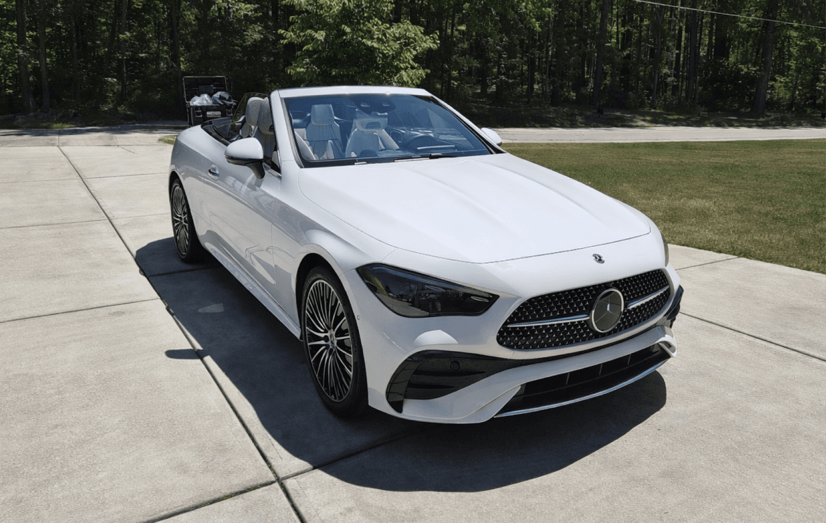 1985 Porsche 944 sitting in a parking lot at night.