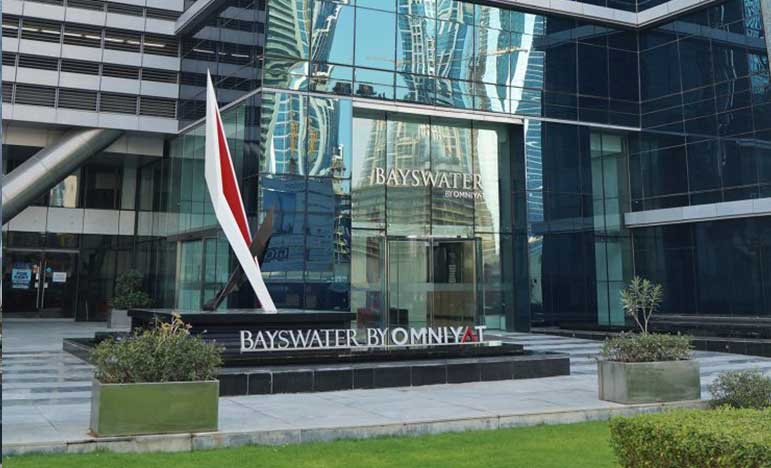 Bayswater by Omniyat entrance, showcasing prime commercial real estate listings for business professionals.