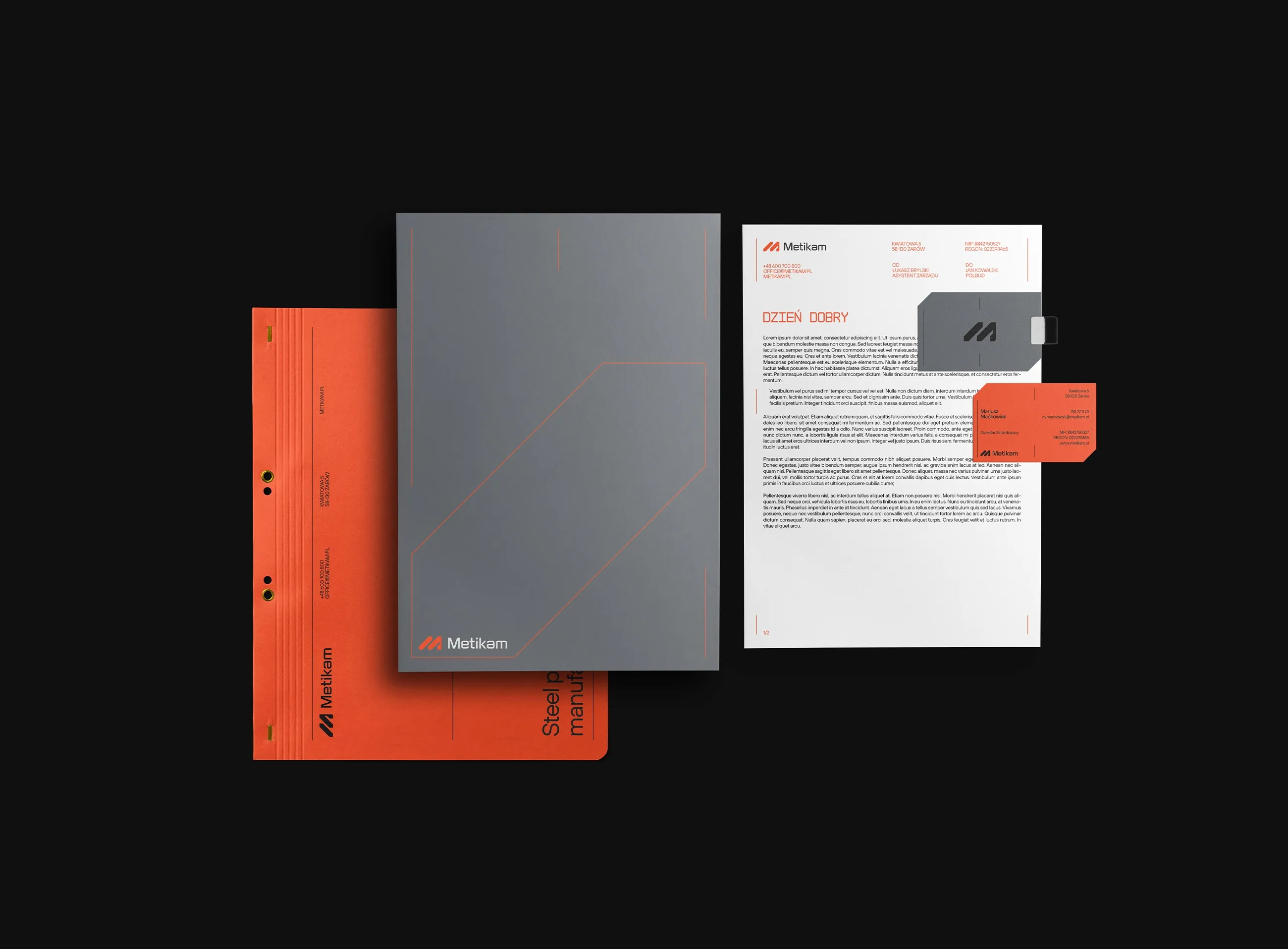 Metikam stationery set with orange folder, grey brochure cover, letterhead and business card on black, brand identity