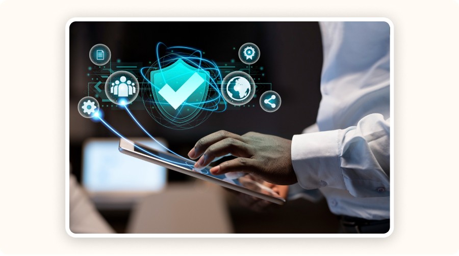  User’s hand on a tablet, surrounded by floating icons and a glowing shield with a checkmark, symbolizing cybersecurity, data protection, and secure network access control.
