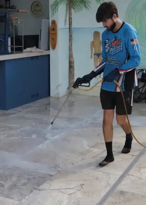 Paver sealing technician sealing travertine