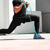 Person performing resistance training to build muscle, improve bone density, and support metabolic health and healthy aging.