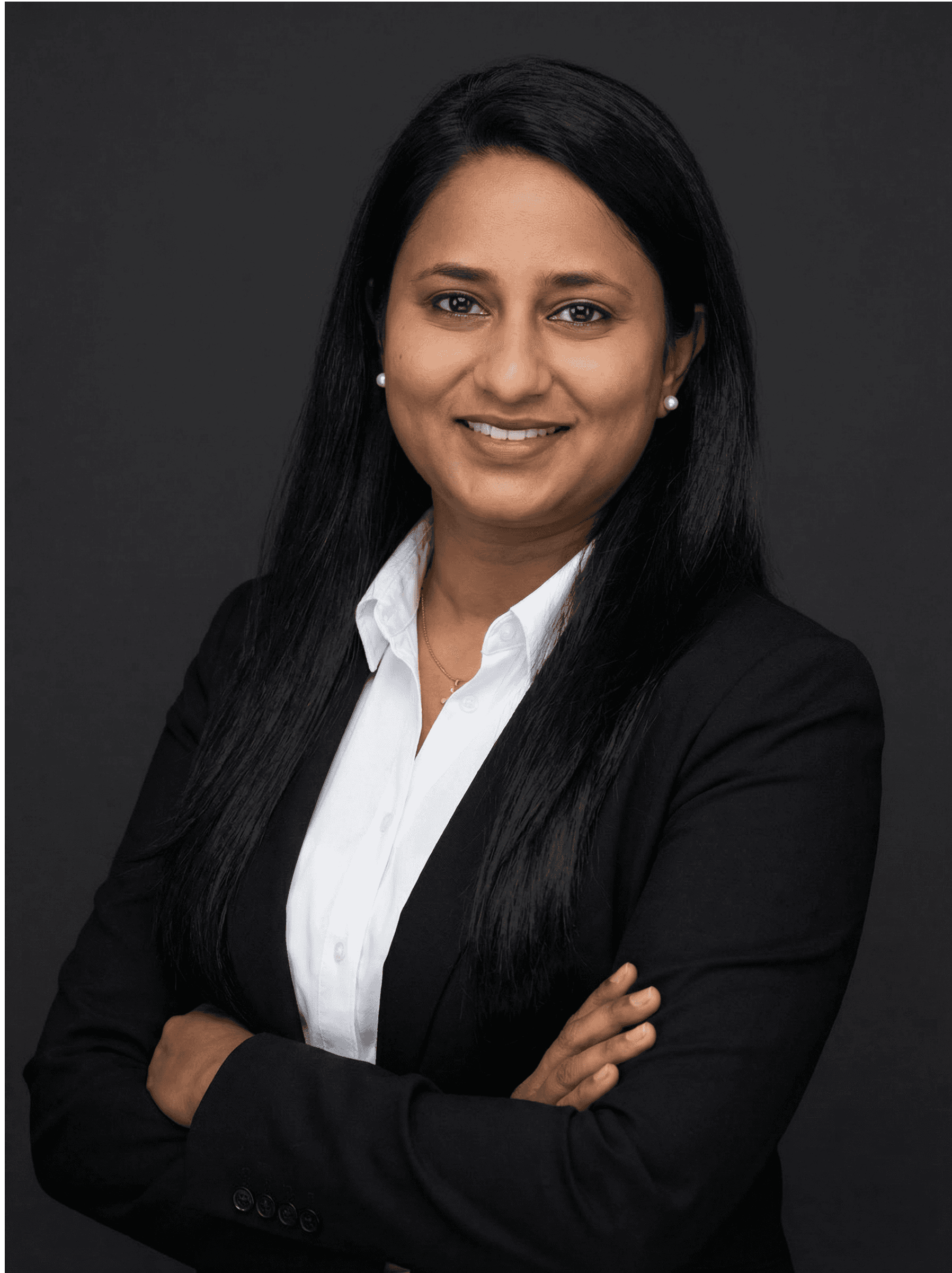 Profile portrait of a man in a white shirt against a light background