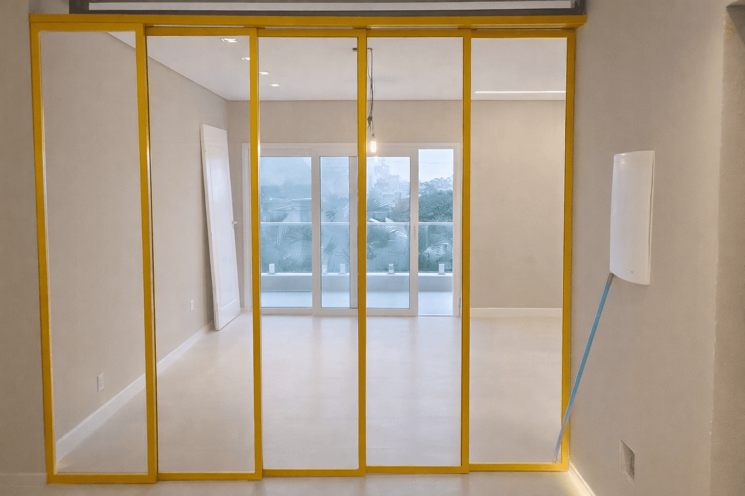 man wearing gray polo shirt beside dry-erase board