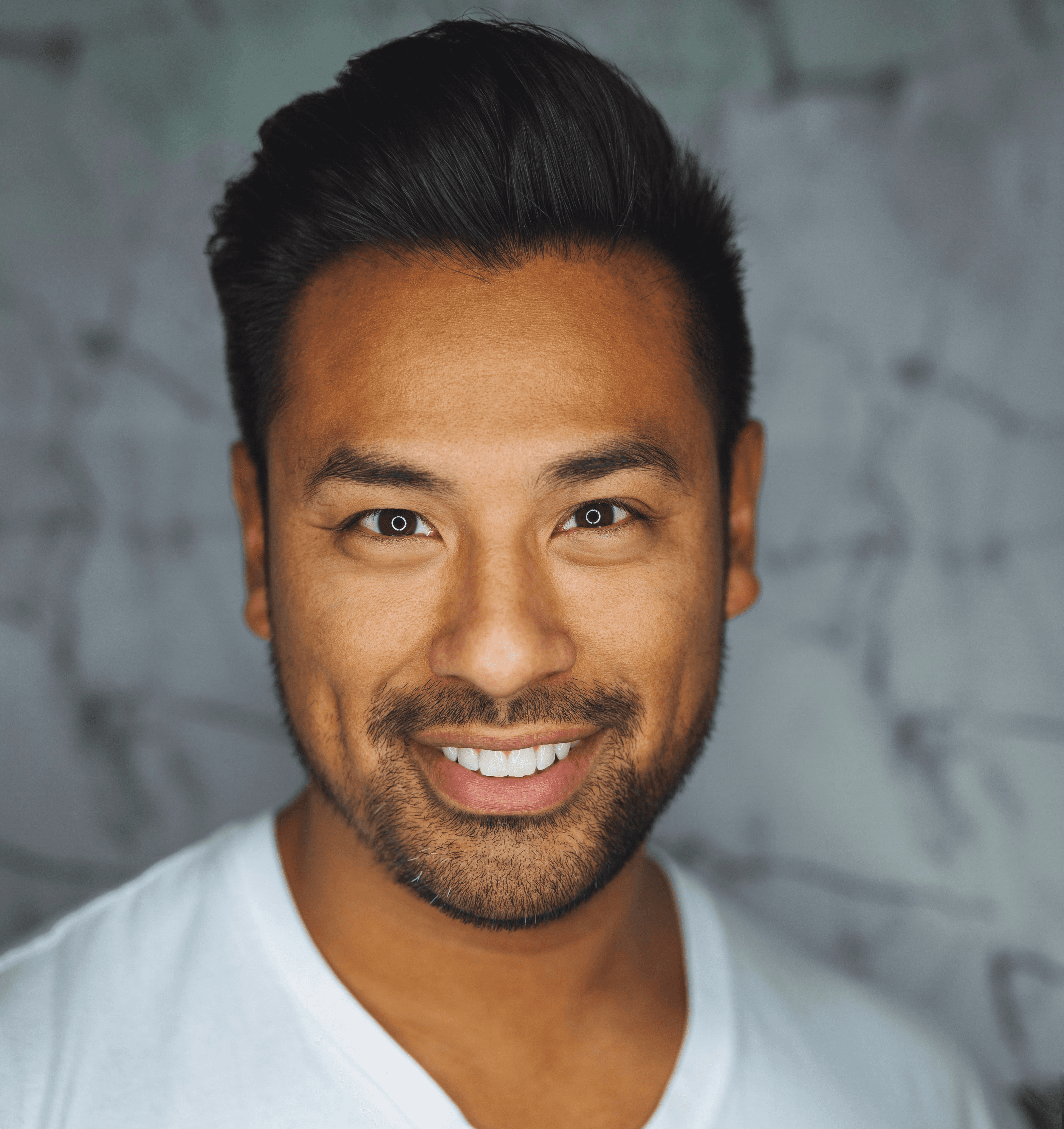 man wearing white V-neck shirt