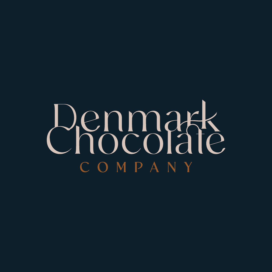 Premium brand identity for The Denmark Chocolate Company featuring nature-inspired logo and packaging