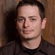 Photograph of Adam Eisner, Director of OpenSRS Product Management