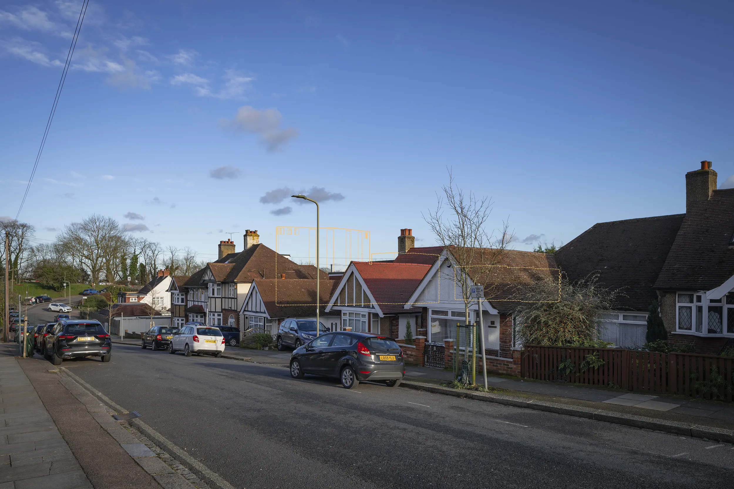 Winter Type 4 AVR Level 3 verified view due east along Milton Avenue, with the upper levels of Building A above the foreground bungalows and a small section of Building B glimpsed.