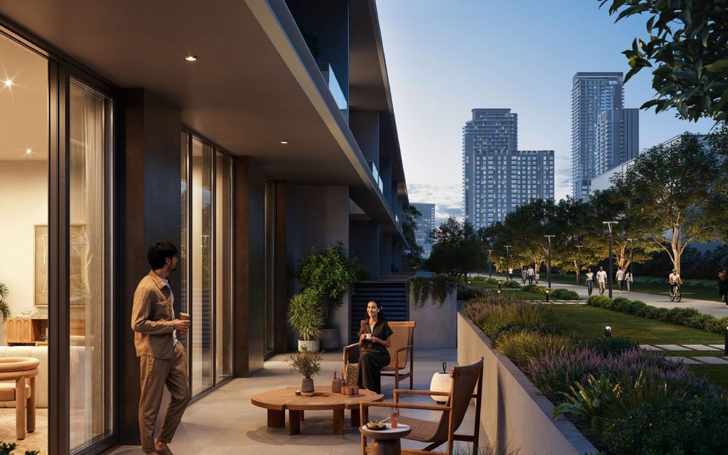 Top-down view of Dubai Creek Harbour from a building, capturing the blend of urban landscape and water.