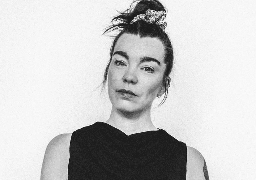 female photographer with red hair