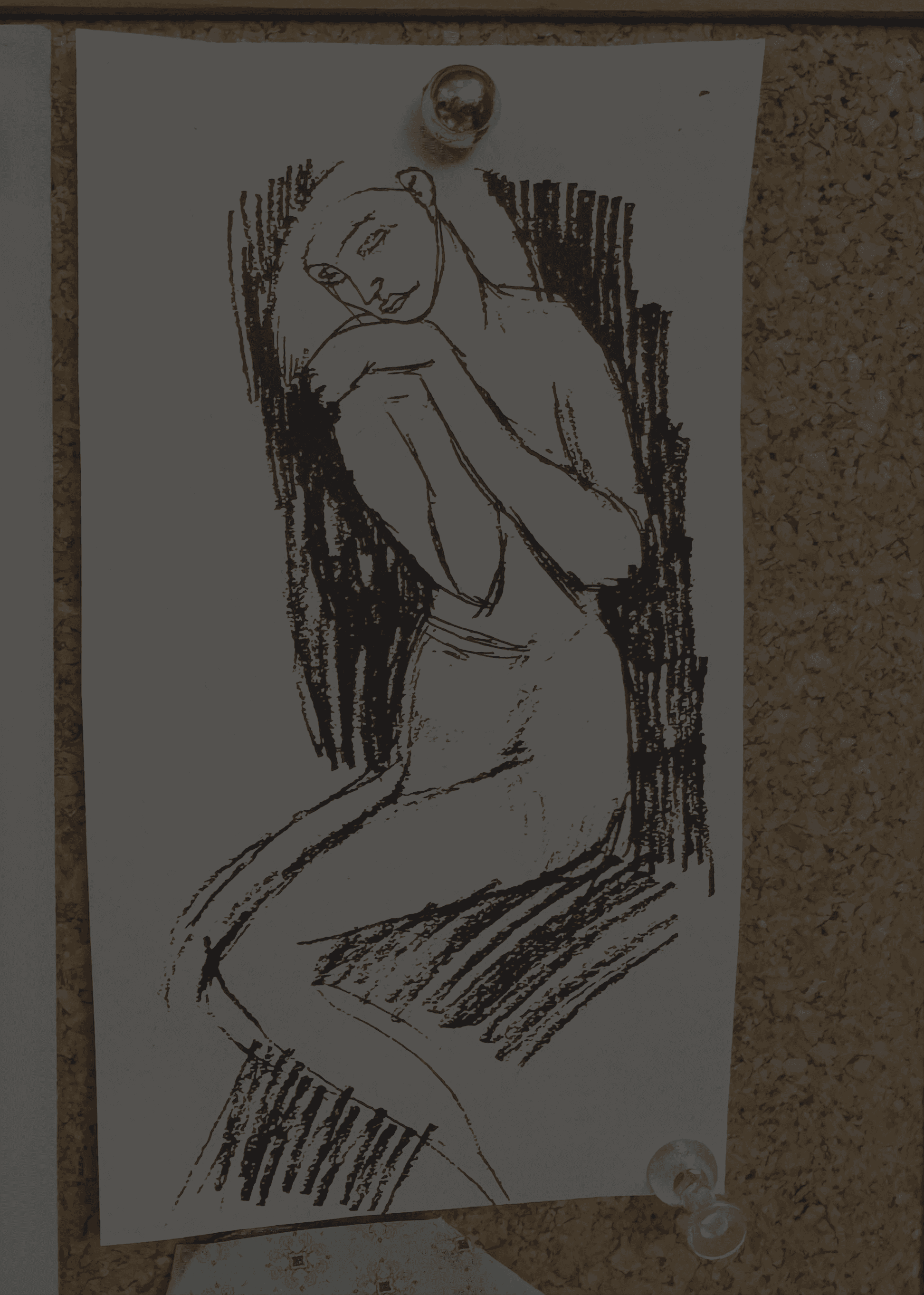 a woman covering her face with her hands