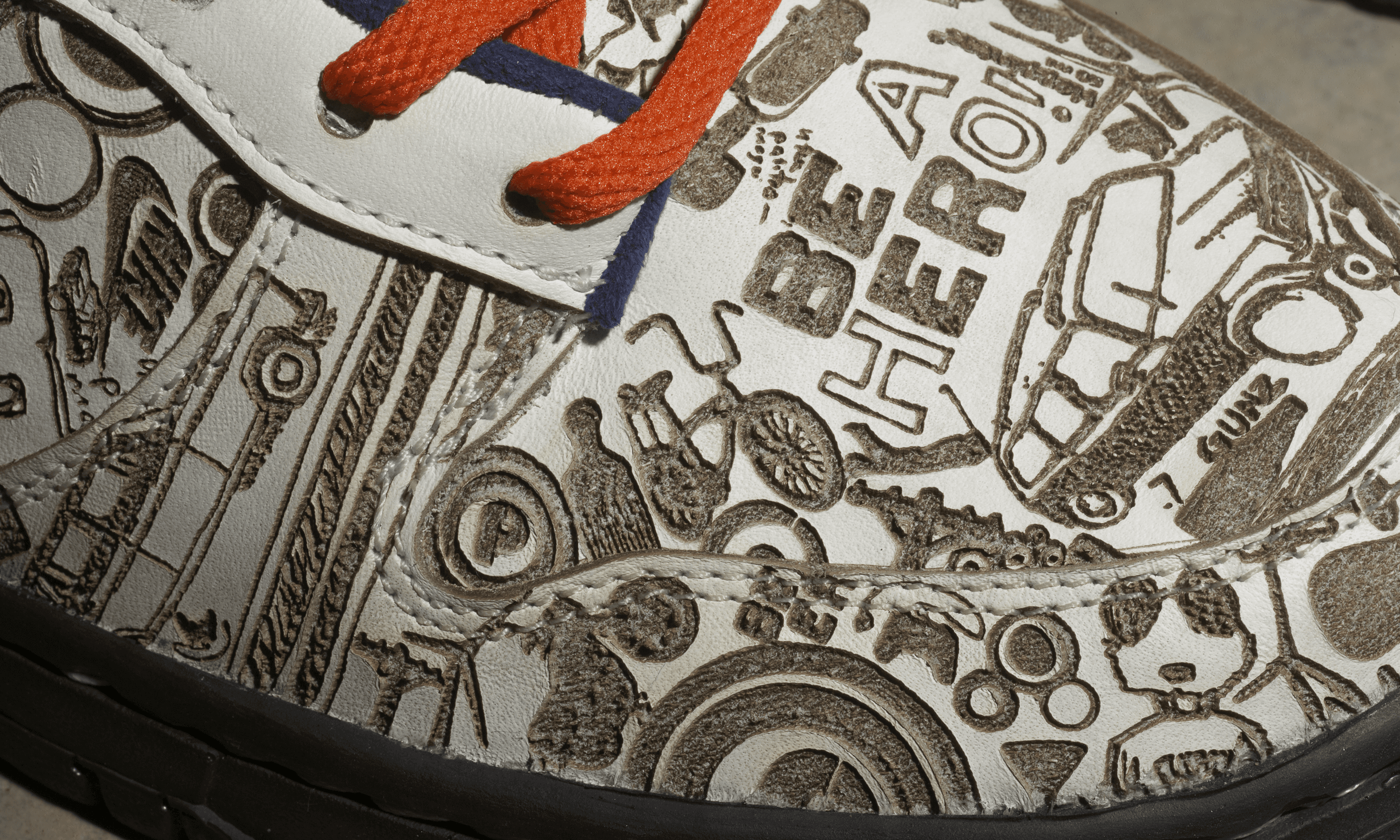 tight crop, detail of custom lasered nike dunk shoes