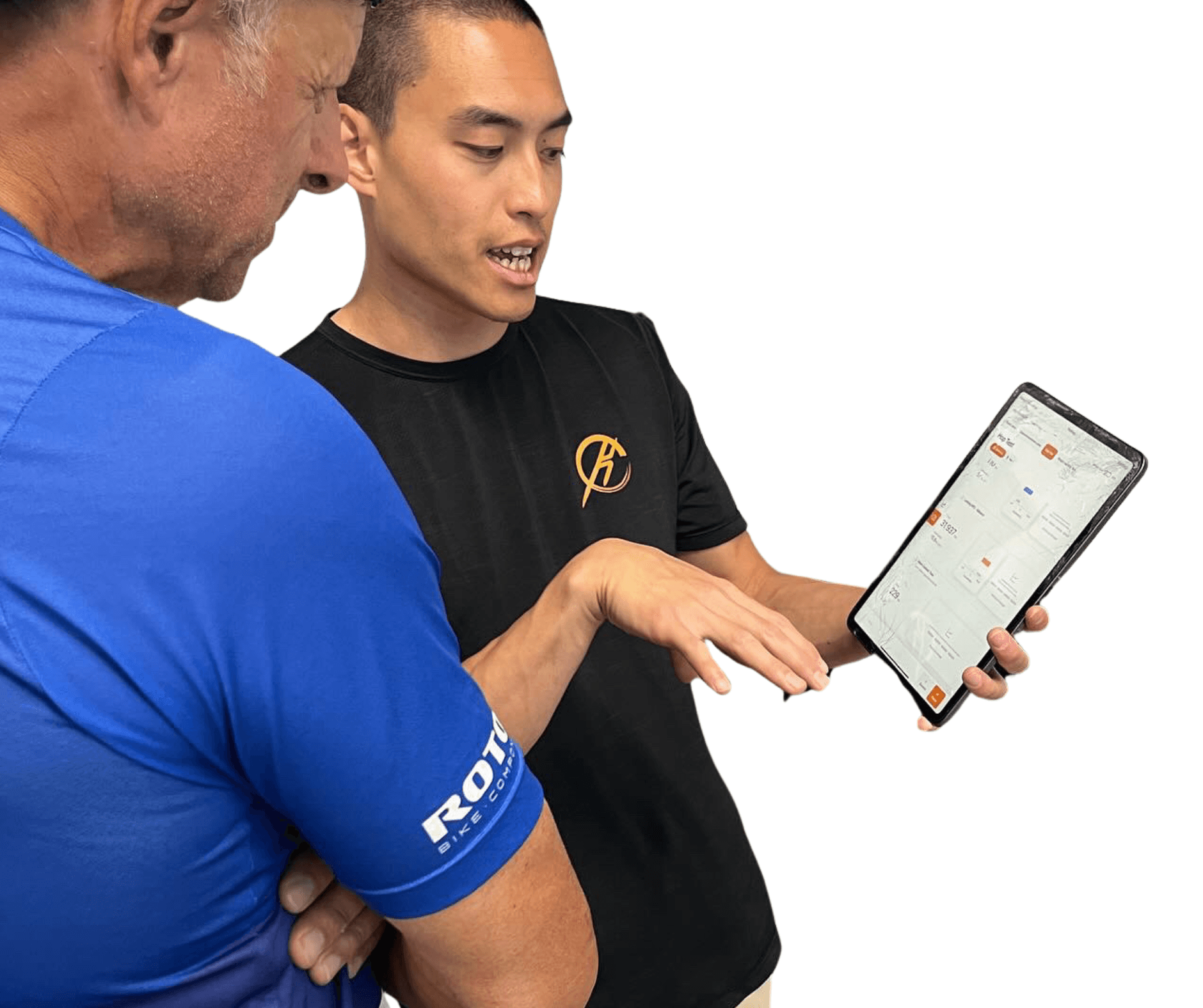 Couple looking at tablet in a gym