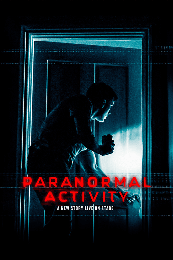 Man with flashlight opening door, Paranormal Activity West End show.