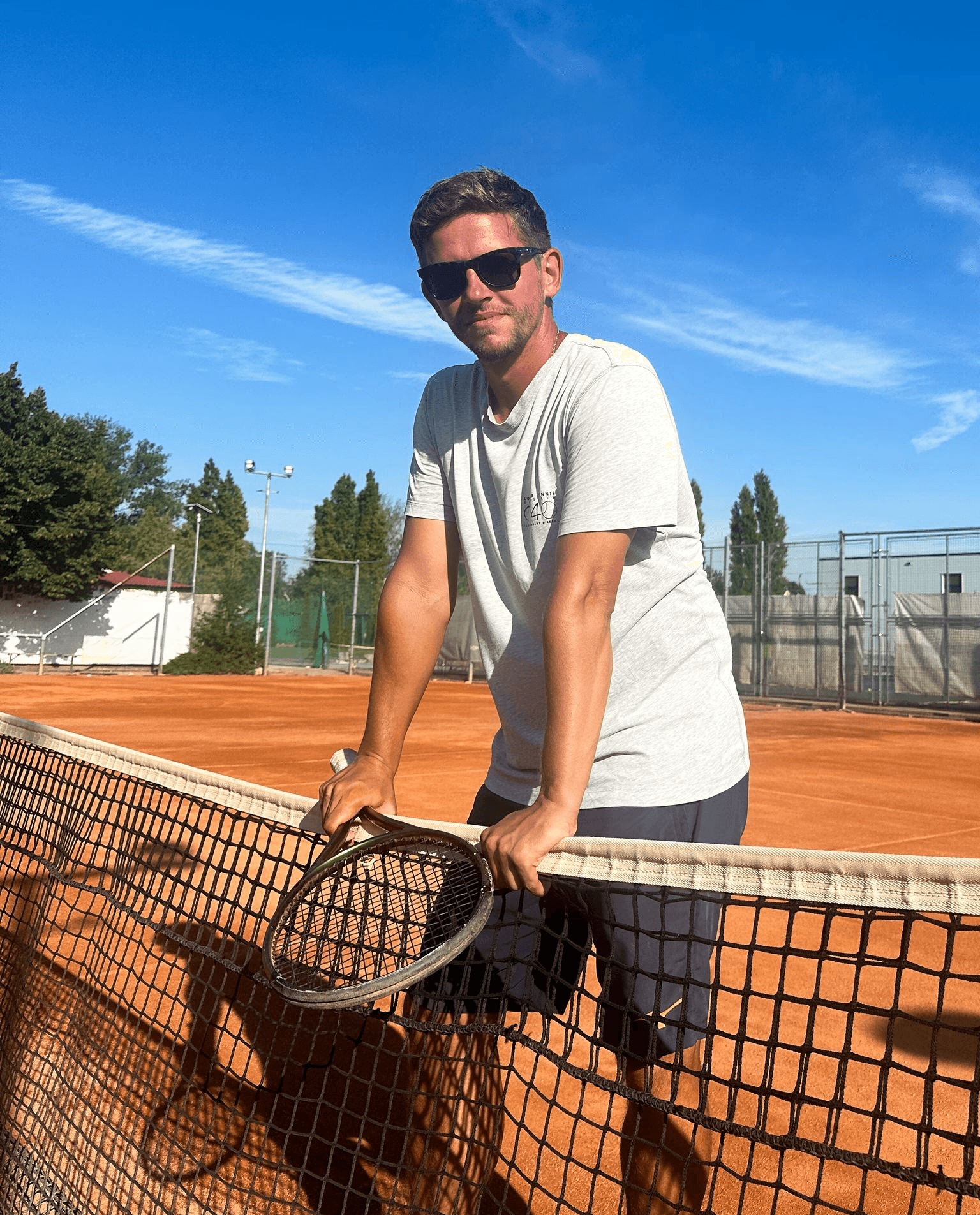 A female tennis player playing tennis