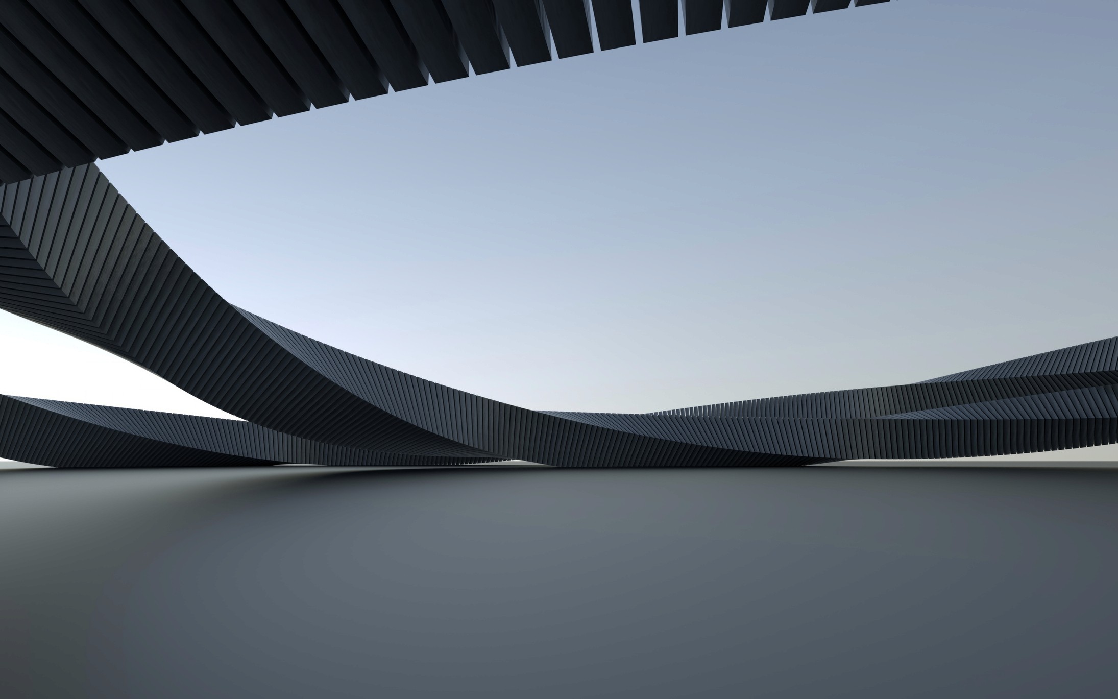 woman in blue tank top standing beside white wall