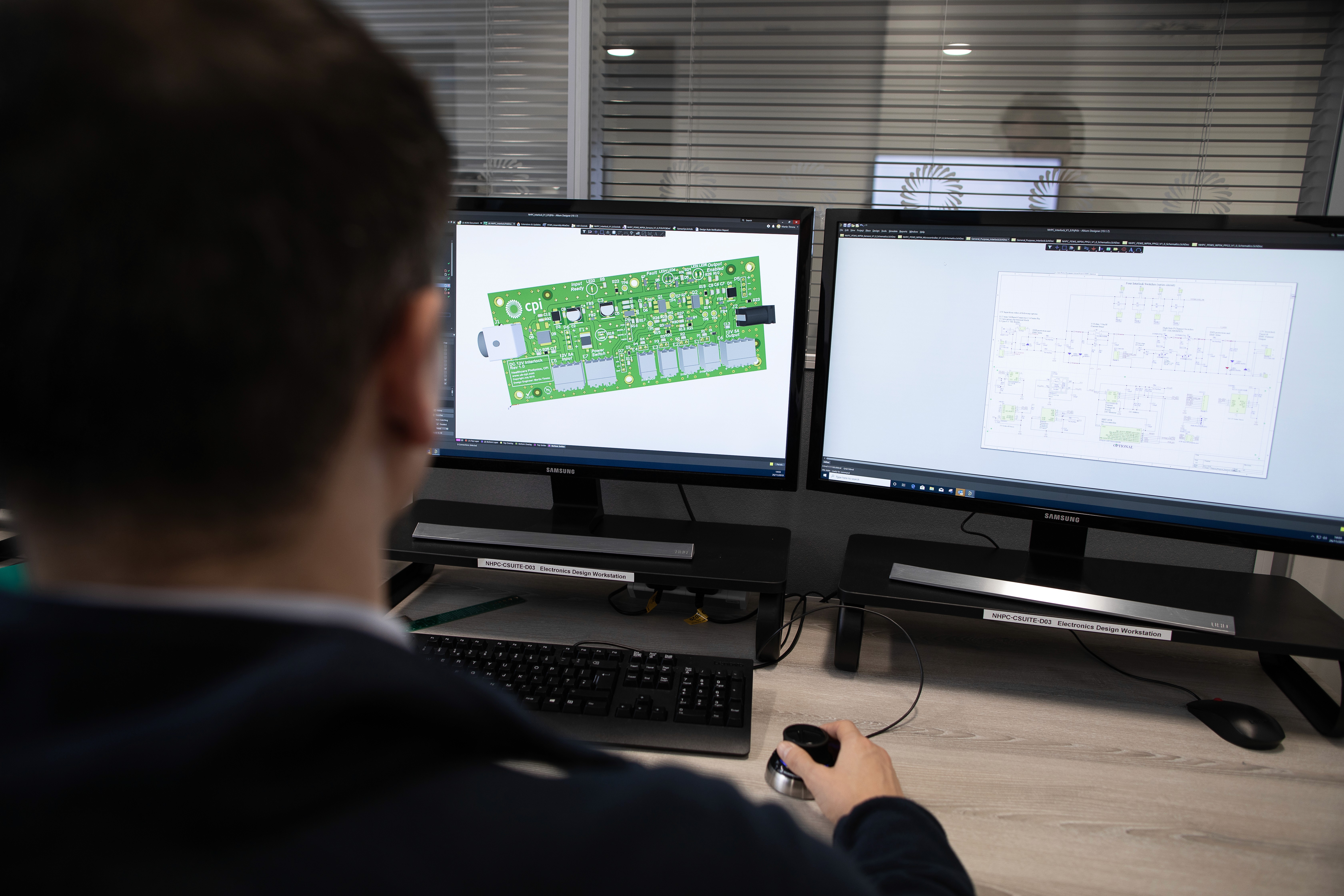 CPI expert examining a digital version of an electronic circuit.