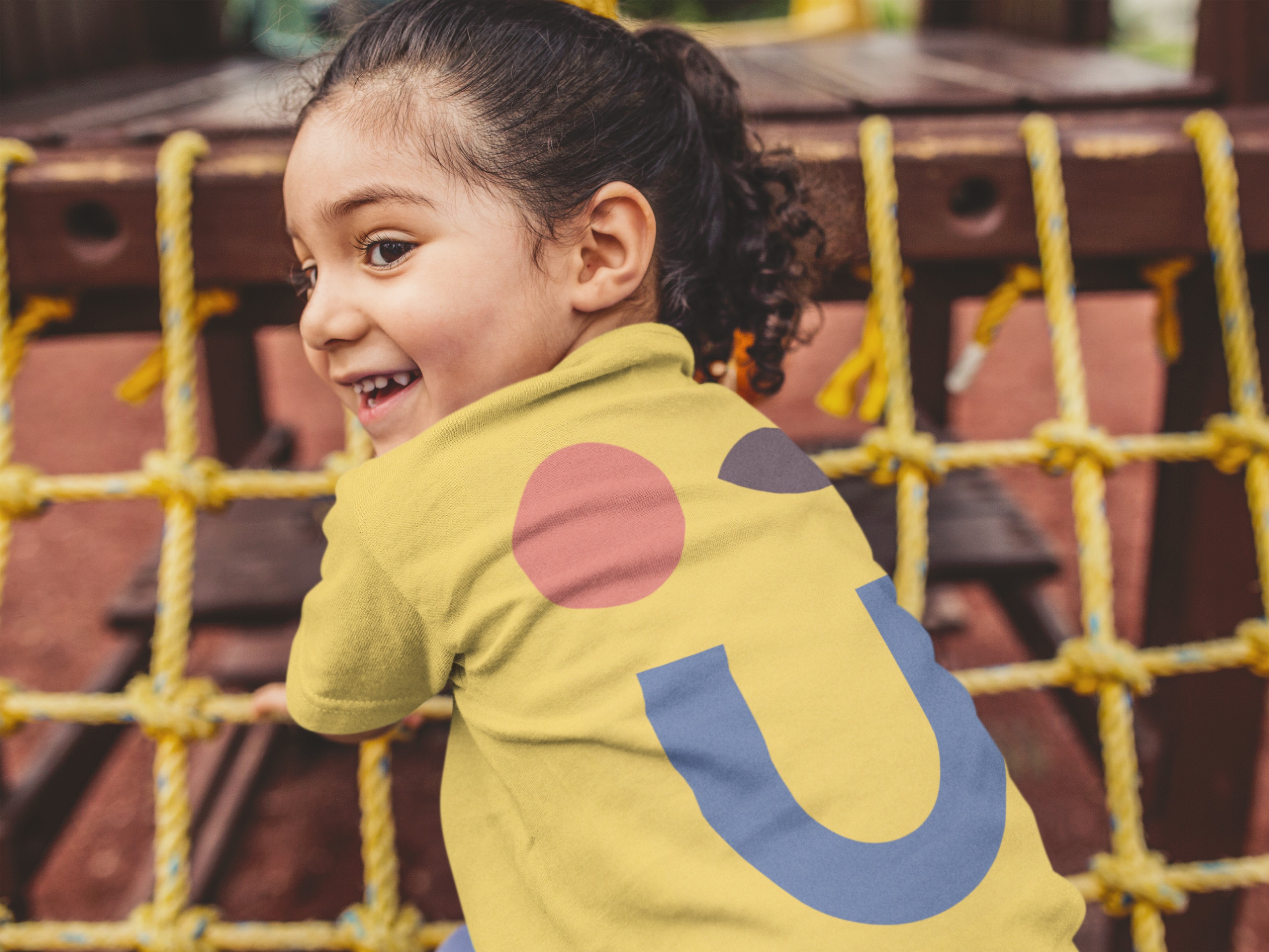 Grafisch ontwerp Christophoor schoolkindje met trui in huisstijl