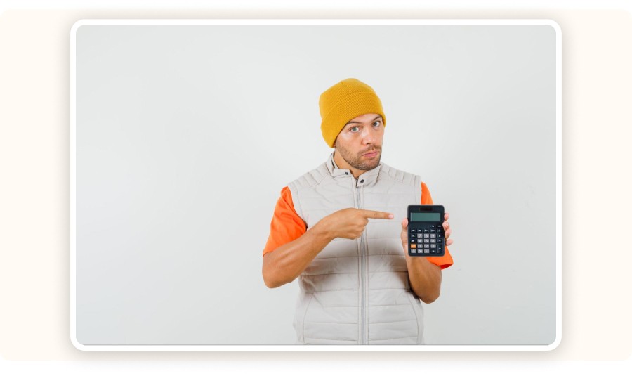 Man pointing at a calculator