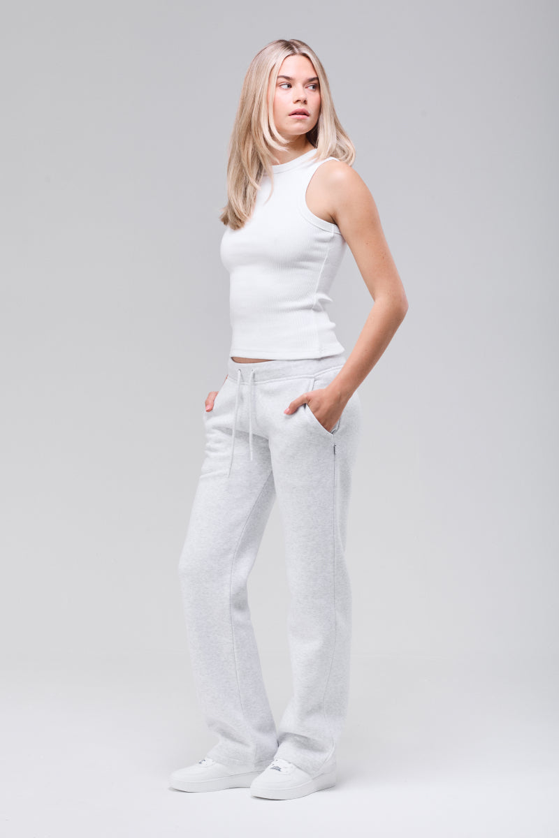 Model wearing heather grey Elara sweatpants, full figure