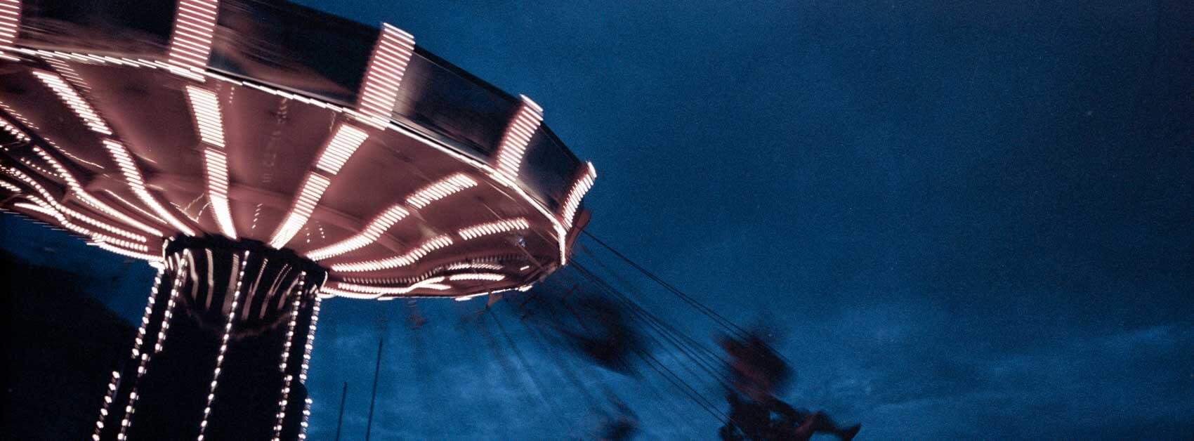 Fujifilm TX-1 panoramic photo of a attraction with a longer exposure in Chicago, with late evening light and strong use of slow shutter speed.