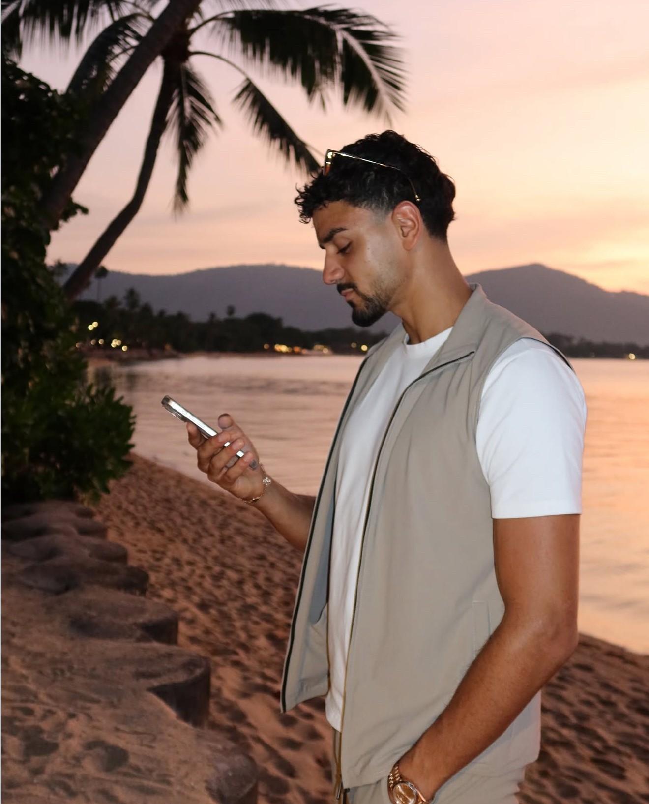 man standing beside wall