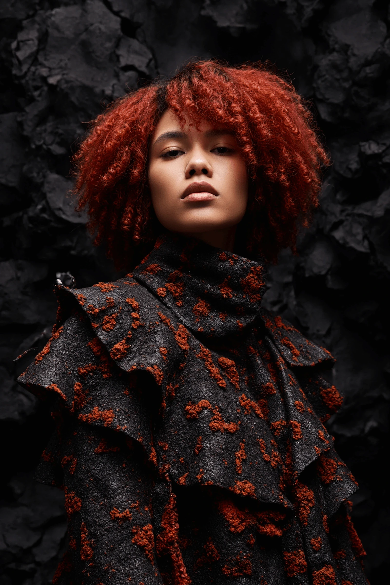 Female model in molten-textured outfit