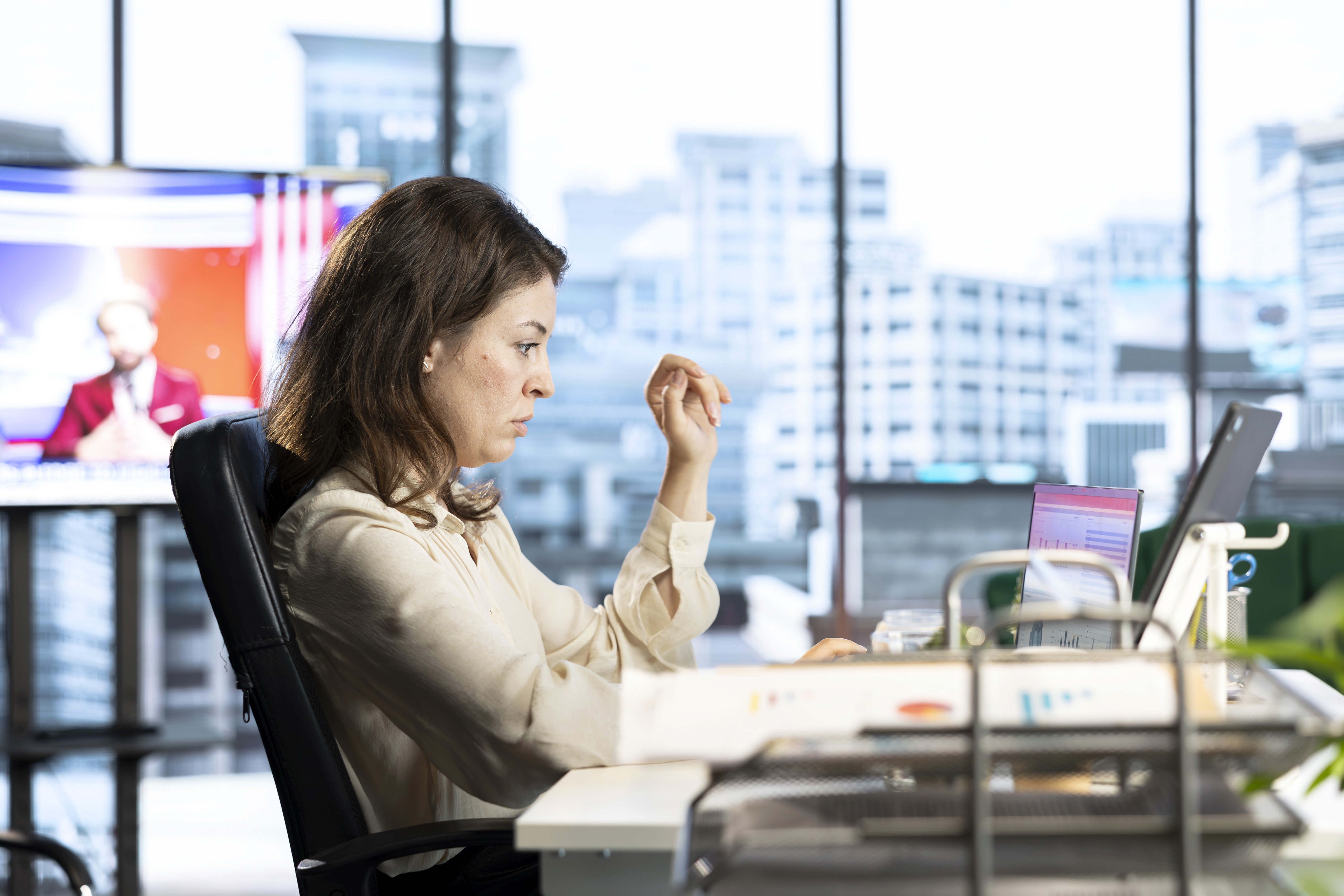 man sitting beside woman looking at a contract on DocuSign