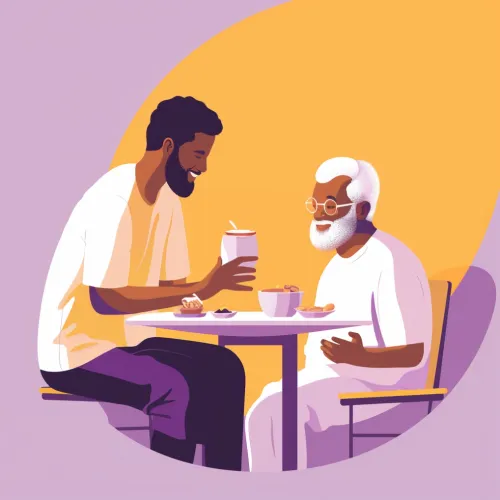 A healthcare worker assisting an elderly man with his meal.