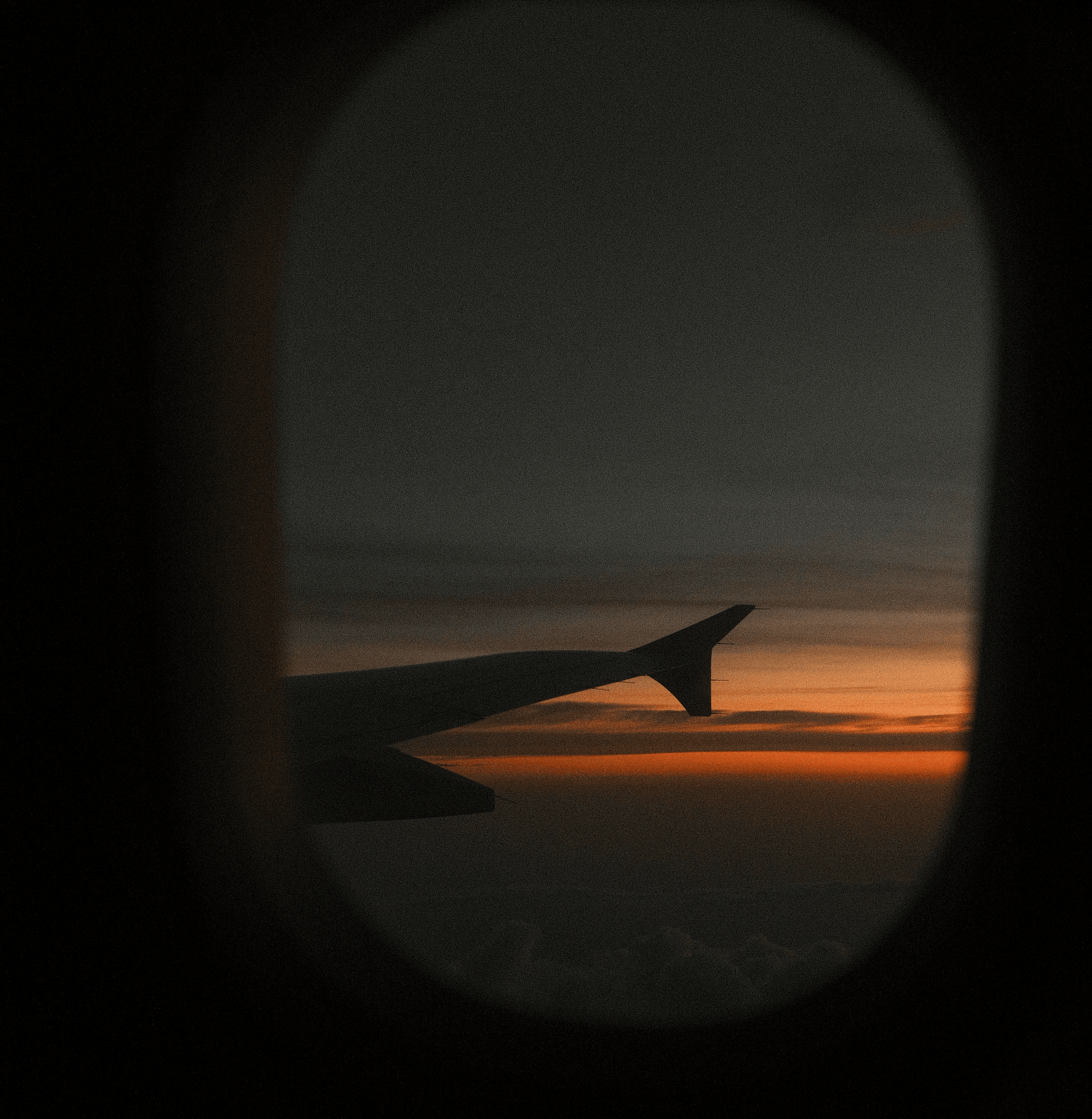 A gradient of dark brown to bright orange