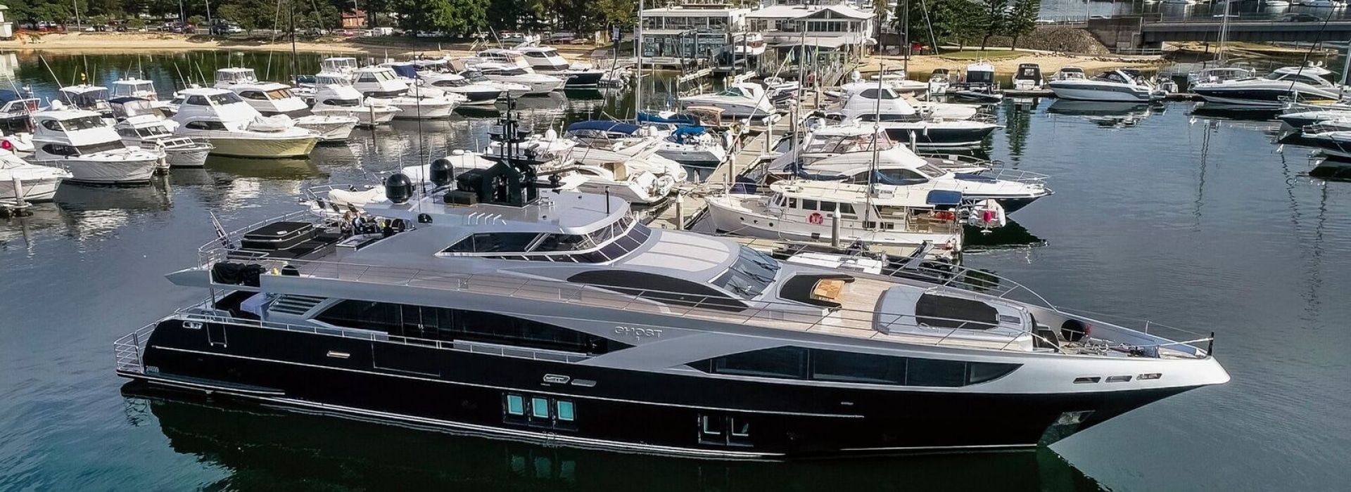 Boats docked in calm harbor