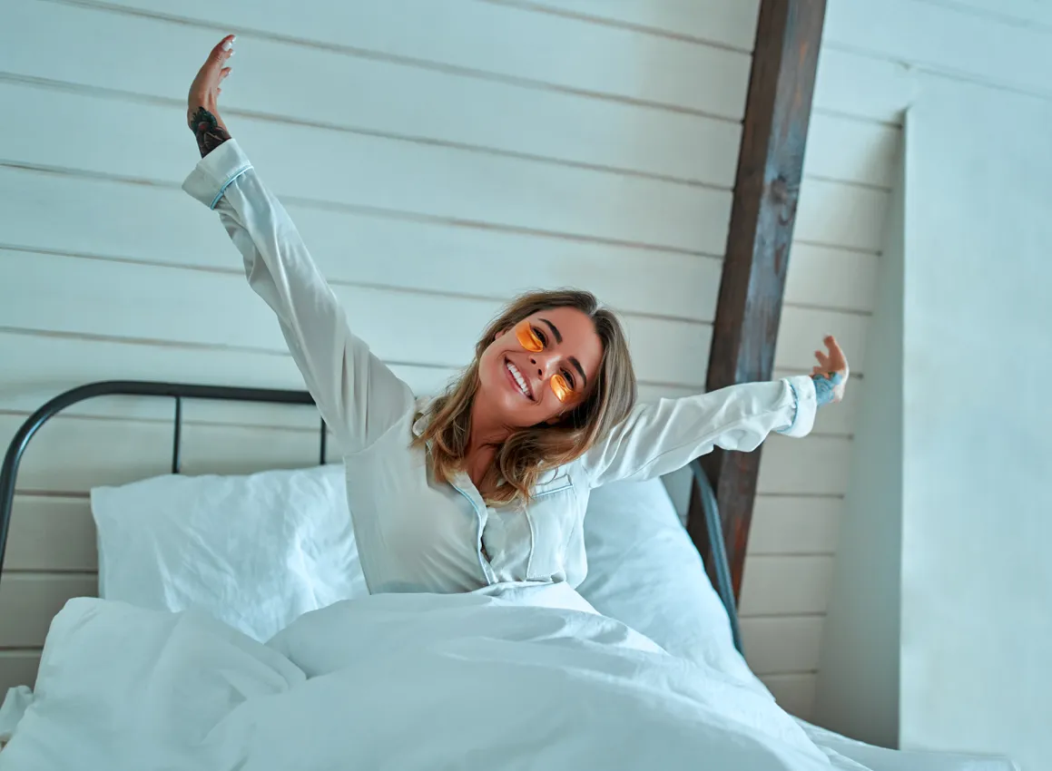 woman waking up happy