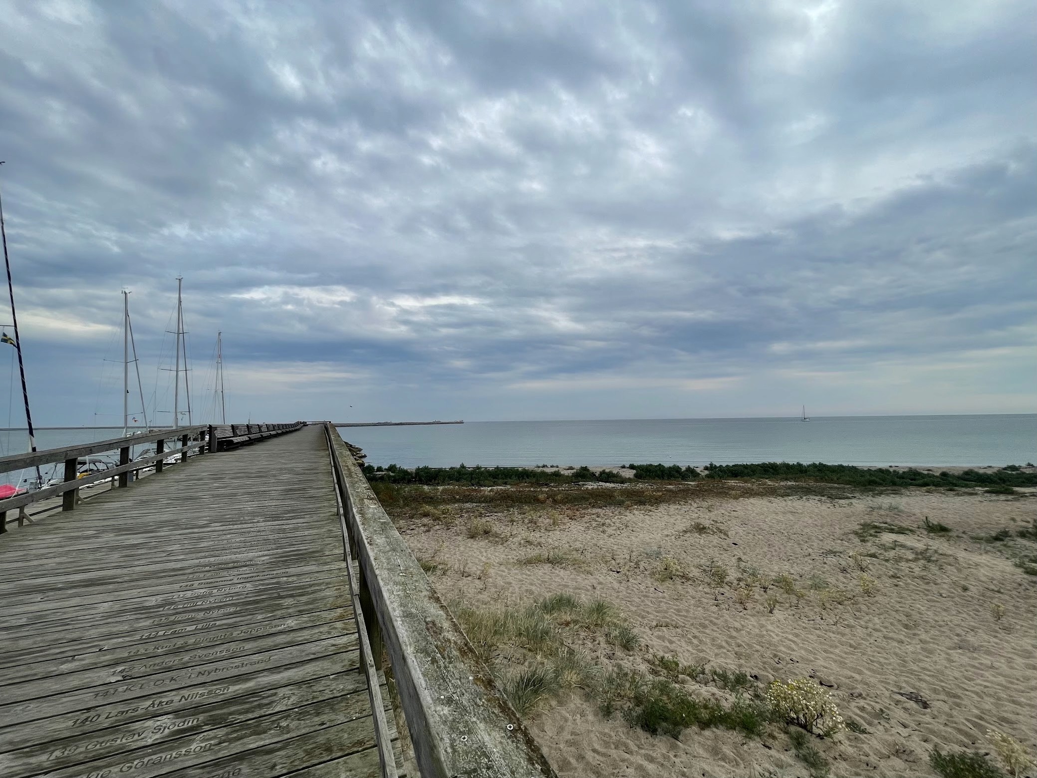 man drawing on dry-erase board
