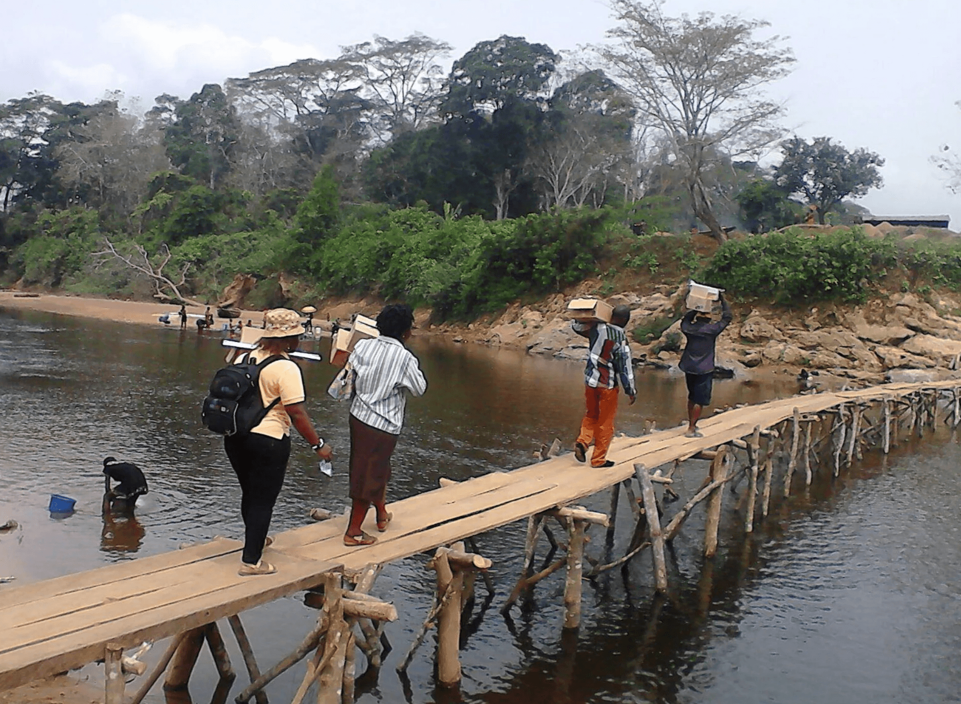 three children at the beach during golden hour